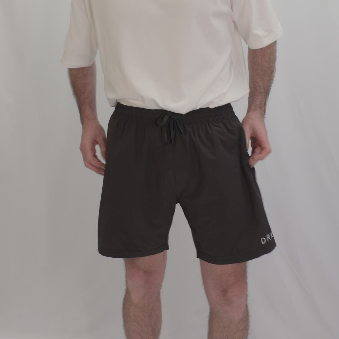 Video of a man in the Endure 7 inch Shorts showing the fit, pockets and leg length
