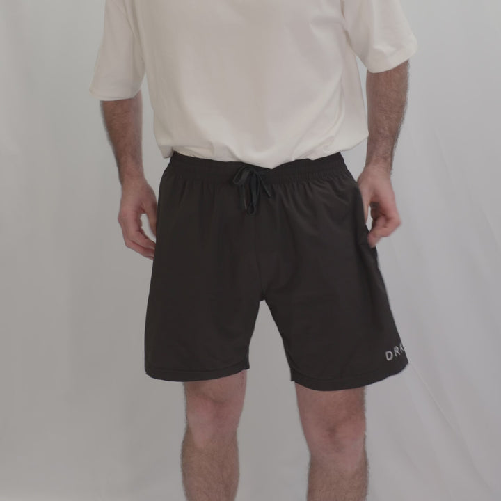Video of a man in the Endure 7 inch Shorts showing the fit, pockets and leg length