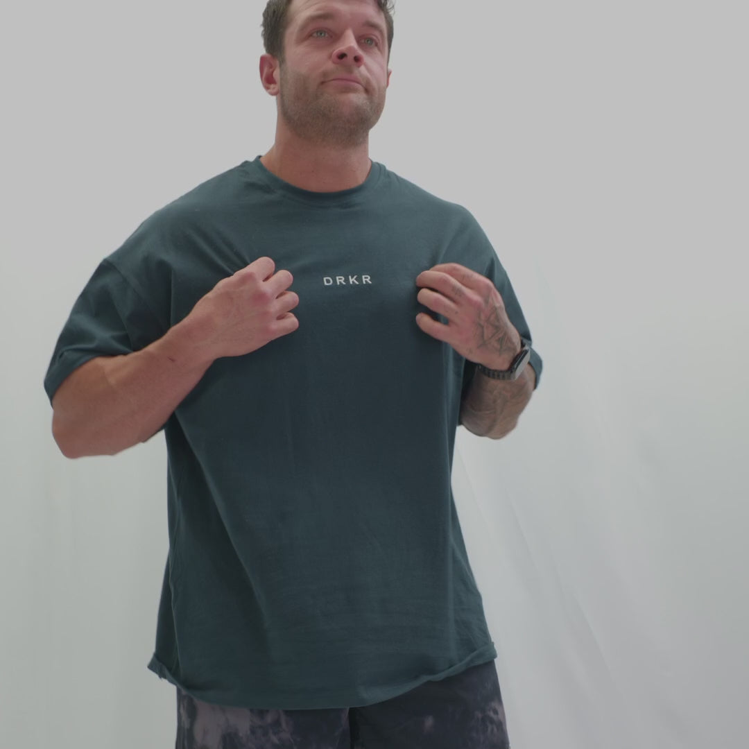 Video of a man in the Endure Oversized Tee showing the relaxed oversized fit