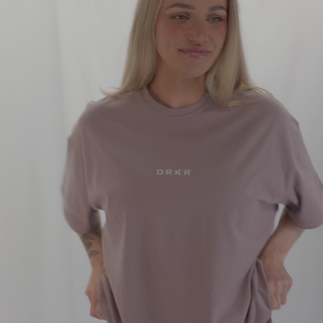 Video of a woman in the Endure Oversized Tee showing the relaxed oversized fit